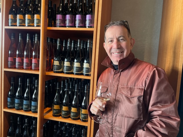 Owner of 'The Barber Room' Joe Micale, relaxing outside of working and enjoying his other passion ....drinking wine... He has become somewhat of wine buff and loves his wines almost as much as his Hair Styling.